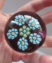 Load image into Gallery viewer, 1970s Perthshire Paperweight Millefiori Star Shaped Clusters Purple Ground PP10
