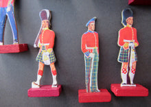 Load image into Gallery viewer, 1950s Box of Printed Card Toy Soldiers with Wooden Stands. MASCOT
