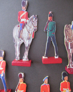 1950s Box of Printed Card Toy Soldiers with Wooden Stands. MASCOT