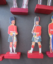 Load image into Gallery viewer, 1950s Box of Printed Card Toy Soldiers with Wooden Stands. MASCOT

