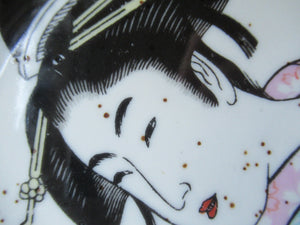 Three Japanese Stoneware Stoneware Plates. Geisha Girls