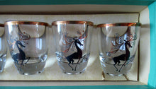 Load image into Gallery viewer, Vintage 1960s Shot Glasses with Black and Gold Reindeer Images
