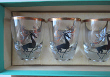 Load image into Gallery viewer, Vintage 1960s Shot Glasses with Black and Gold Reindeer Images
