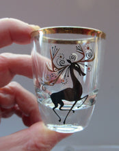 Load image into Gallery viewer, Vintage 1960s Shot Glasses with Black and Gold Reindeer Images

