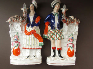 Large Matching Pair Staffordshire Figurines. Man and Woman at a Well with Goats. Antique 1860s