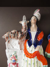 Load image into Gallery viewer, Large Matching Pair Staffordshire Figurines. Man and Woman at a Well with Goats. Antique 1860s
