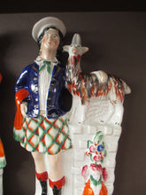 Load image into Gallery viewer, Large Matching Pair Staffordshire Figurines. Man and Woman at a Well with Goats. Antique 1860s
