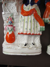 Load image into Gallery viewer, Large Matching Pair Staffordshire Figurines. Man and Woman at a Well with Goats. Antique 1860s
