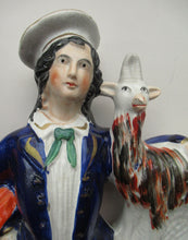 Load image into Gallery viewer, Large Matching Pair Staffordshire Figurines. Man and Woman at a Well with Goats. Antique 1860s
