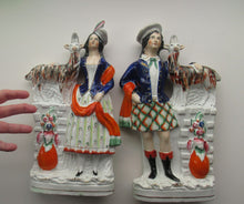 Load image into Gallery viewer, Large Matching Pair Staffordshire Figurines. Man and Woman at a Well with Goats. Antique 1860s
