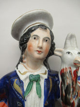 Load image into Gallery viewer, Large Matching Pair Staffordshire Figurines. Man and Woman at a Well with Goats. Antique 1860s
