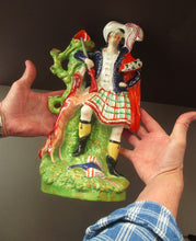 Load image into Gallery viewer, Huge Staffordshire Figurine Spill Vase: Gamekeeper or Hunter with his Retriever Dog
