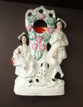 Load image into Gallery viewer, Staffordshire Flatback Watchholder Watch Holder. Couple at a Fruiting Bough
