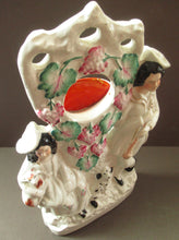 Load image into Gallery viewer, Staffordshire Flatback Watchholder Watch Holder. Couple at a Fruiting Bough
