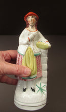 Load image into Gallery viewer, Single Staffordshire Antique Figure of a Lady Collecting Flowers
