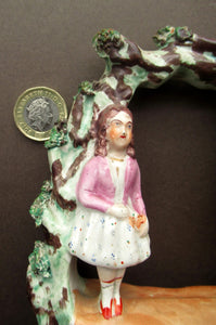 Miniature Staffordshire Flatback Figurine. Couple in a Bough with Swan and Bridge