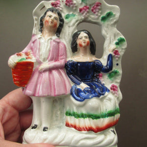 Antique Miniature Staffordshire Figurine. Couple Under a Fruiting  Vine