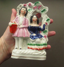 Load image into Gallery viewer, Antique Miniature Staffordshire Figurine. Couple Under a Fruiting  Vine
