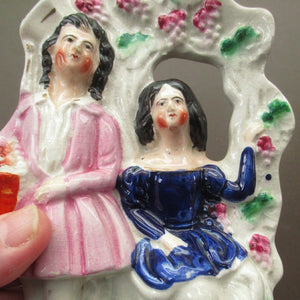 Antique Miniature Staffordshire Figurine. Couple Under a Fruiting  Vine