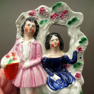 Antique Miniature Staffordshire Figurine. Couple Under a Fruiting  Vine