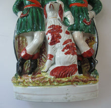 Load image into Gallery viewer, Antique Victorian Spill Vase Featuring a Pair of Huntsmen Wearing Short Green Tunics with a Large Dog
