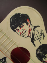 Load image into Gallery viewer, Genuine Vintage 1960s Beatles Selcol Toy Guitar with Images of the Band
