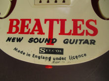 Load image into Gallery viewer, Genuine Vintage 1960s Beatles Selcol Toy Guitar with Images of the Band
