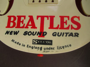 Genuine Vintage 1960s Beatles Selcol Toy Guitar with Images of the Band