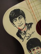 Load image into Gallery viewer, Genuine Vintage 1960s Beatles Selcol Toy Guitar with Images of the Band
