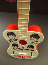 Load image into Gallery viewer, Genuine Vintage 1960s Beatles Selcol Toy Guitar with Images of the Band
