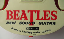 Load image into Gallery viewer, Genuine Vintage 1960s Beatles Selcol Toy Guitar with Images of the Band
