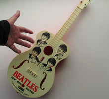 Load image into Gallery viewer, Genuine Vintage 1960s Beatles Selcol Toy Guitar with Images of the Band
