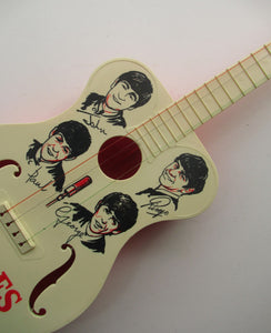 Genuine Vintage 1960s Beatles Selcol Toy Guitar with Images of the Band