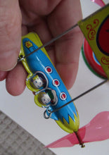 Load image into Gallery viewer, Products Vintage 2000 SCHYLLING Rocket Ride Carousel. Tin Plate Clockwork. Rotating Rockets. BOXED
