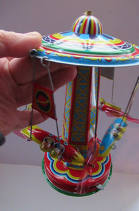Products Vintage 2000 SCHYLLING Rocket Ride Carousel. Tin Plate Clockwork. Rotating Rockets. BOXED