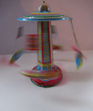 Load image into Gallery viewer, Products Vintage 2000 SCHYLLING Rocket Ride Carousel. Tin Plate Clockwork. Rotating Rockets. BOXED
