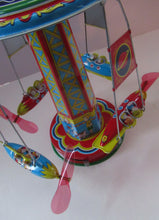 Load image into Gallery viewer, Products Vintage 2000 SCHYLLING Rocket Ride Carousel. Tin Plate Clockwork. Rotating Rockets. BOXED
