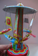 Load image into Gallery viewer, Products Vintage 2000 SCHYLLING Rocket Ride Carousel. Tin Plate Clockwork. Rotating Rockets. BOXED
