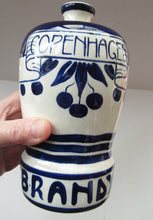 Load image into Gallery viewer, Antique Royal Copenhagen Ceramic Cherry Brandy Advertising Bottle
