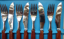 Load image into Gallery viewer, Vintage 1960s GLOSSWOOD Cutlery. Stainless Steel Fish Knives and Forks with Teak Effect Handles. Original Retail Box
