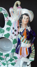 Load image into Gallery viewer, Antique STAFFORDSHIRE POTTERY Pocket Watch Holder. Large Figurine with Couple Standing in Vineyard with Two Peacocks Above
