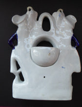 Load image into Gallery viewer, Antique STAFFORDSHIRE POTTERY Pocket Watch Holder. Large Figurine with Couple Standing in Vineyard with Two Peacocks Above
