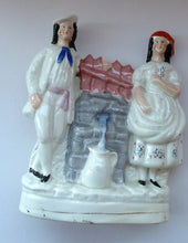 Load image into Gallery viewer, Antique STAFFORDSHIRE Flatback Figurine. Victorian Couple Standing Beside a Water Wall. Excellent Condition
