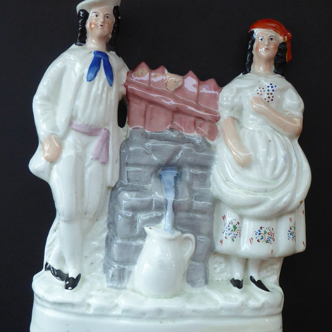 Antique STAFFORDSHIRE Flatback Figurine. Victorian Couple Standing Beside a Water Wall. Excellent Condition