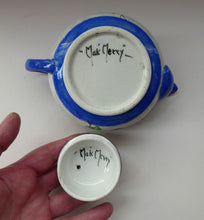 Load image into Gallery viewer, SCOTTISH POTTERY. Rare MakMerry Hand-Painted Teapot with White Prunus Blossoms and Blue Background. Excellent Condition
