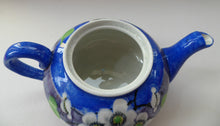 Load image into Gallery viewer, SCOTTISH POTTERY. Rare MakMerry Hand-Painted Teapot with White Prunus Blossoms and Blue Background. Excellent Condition
