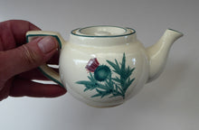 Load image into Gallery viewer, SCOTTISH POTTERY. Rare 1920s Morrison &amp; Crawford ROSSLYN Ware Miniature Teapot from Grantshouse. Hand Painted Scotch Thistles
