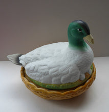 Load image into Gallery viewer, Rare ANTIQUE Staffordshire Bisque DUCK on a NEST. Victorian era; and in excellent condition

