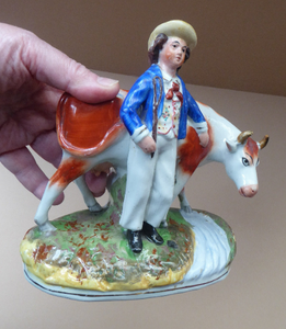 ANTIQUE STAFFORDSHIRE Figurine. Rarer Cow Hand or Herder with Cow by a Stream; 1880s