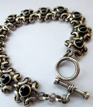 Load image into Gallery viewer, Vintage SOLID SILVER Bracelet with Abstract Floral Design &amp; Black Enamel Details. SIGNED; probably Scandinavian
